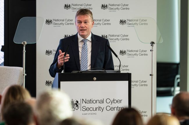 A man giving a presentation at the National Cyber Security Centre